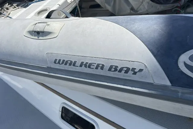 Slide: The Image of Walker Bay inflatable boat on 1990 Catalina 42 yacht deck. - 40