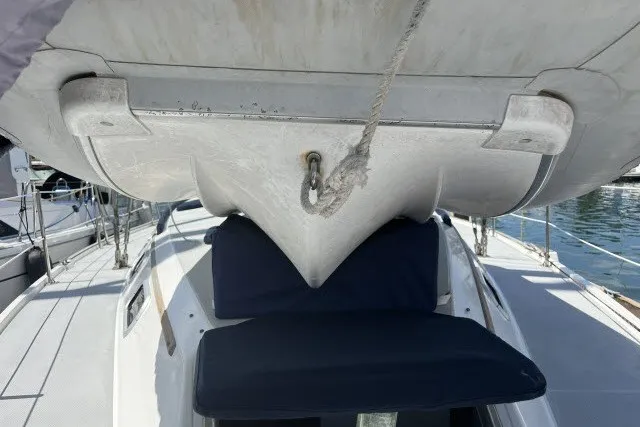 Slide: The Image of Catalina 42 sailboat deck view, showcasing the hull and rigging, 1990 model. - 42