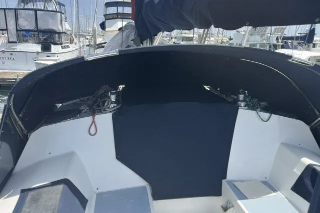 Slide: The Image of Cockpit of a 1990 Catalina 42 sailboat docked at a marina. - 20