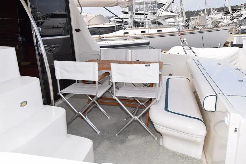 Slide: The Image of Outdoor seating area on a 2005 Sea Ray 500 Sedan Bridge yacht. - 25