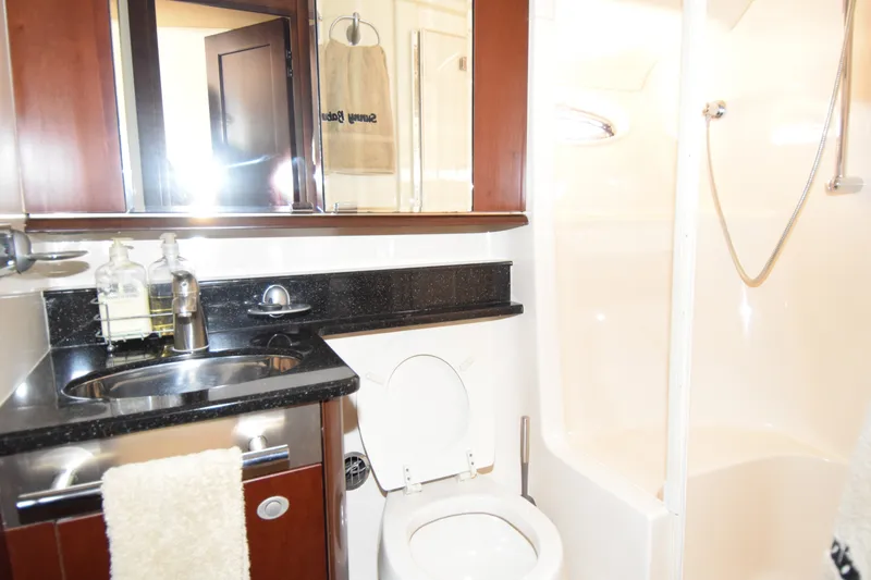 Slide: The Image of Luxurious bathroom in 2005 Sea Ray 500 Sedan Bridge yacht with modern fixtures. - 14