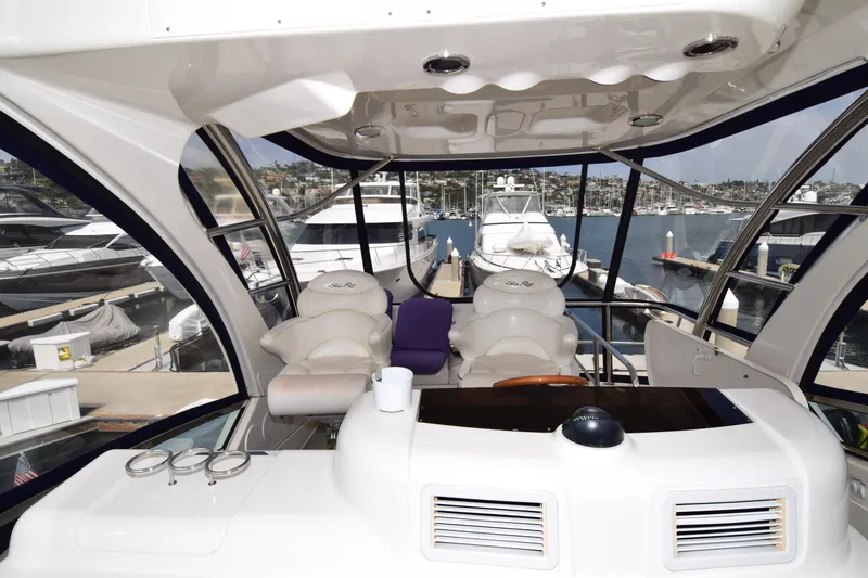 Slide: The Image of Luxurious 2005 Sea Ray 500 Sedan Bridge yacht interior at marina. - 22