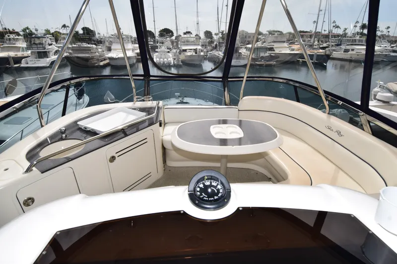 Slide: The Image of Luxurious 2005 Sea Ray 500 Sedan Bridge yacht interior with marina view. - 20
