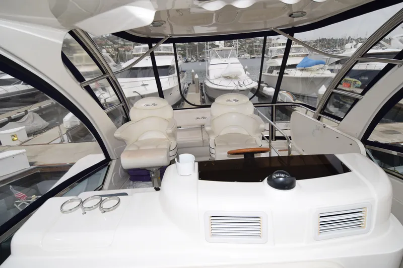 Slide: The Image of Luxurious 2005 Sea Ray 500 Sedan Bridge yacht interior with panoramic marina view. - 38