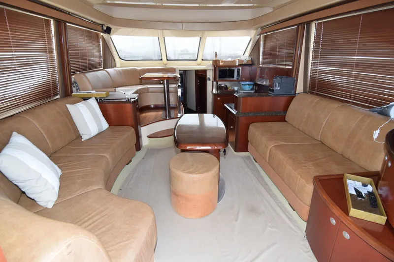Slide: The Image of Luxurious interior of a 2005 Sea Ray 500 Sedan Bridge yacht with plush seating. - 2