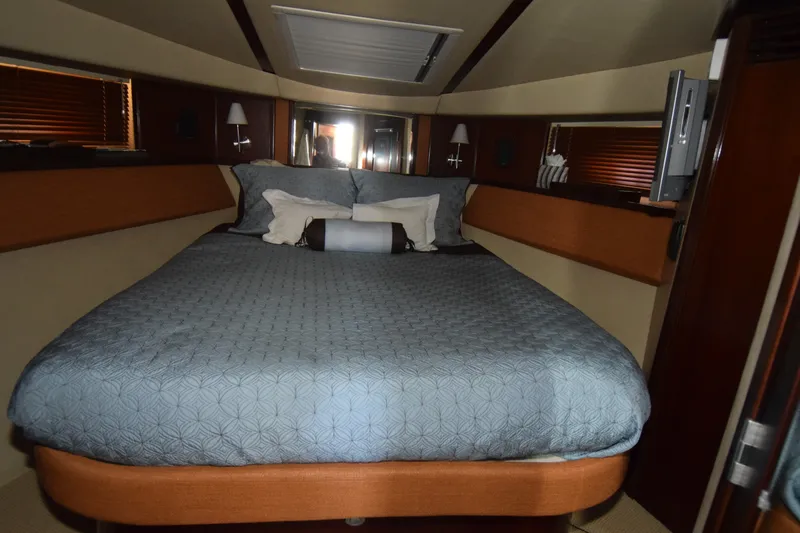 Slide: The Image of Luxurious bedroom interior of 2005 Sea Ray 500 Sedan Bridge yacht. - 9