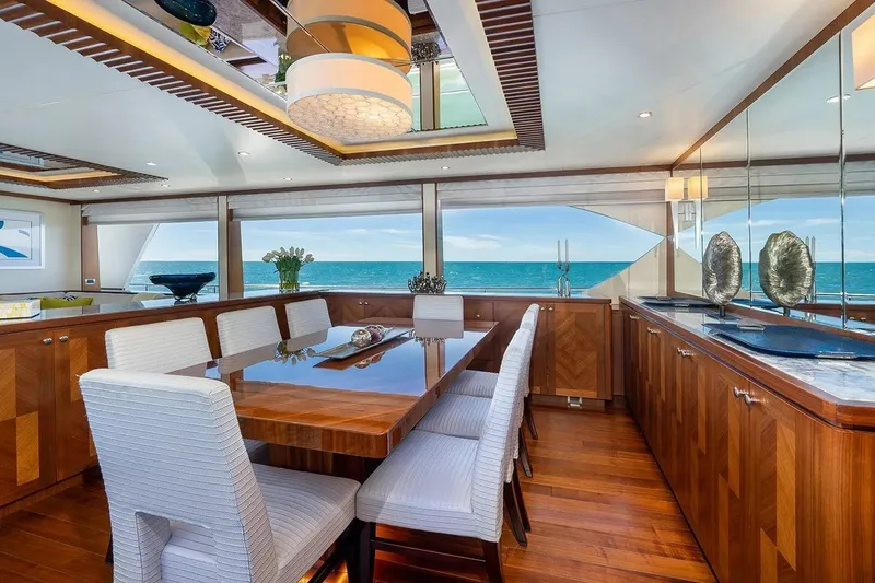 Slide: The Image of Luxurious dining area on a 2016 Ocean Alexander 100 Skylounge Megayacht with ocean views. - 20