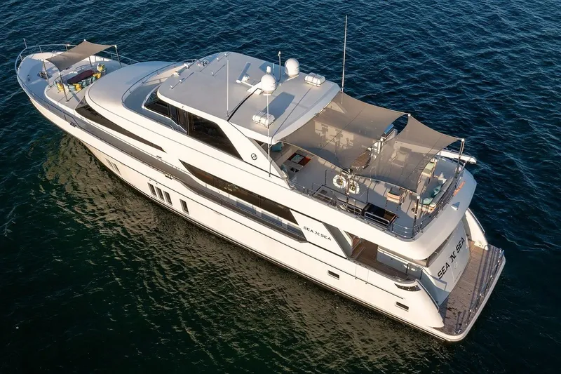 Slide: The Image of 2016 Ocean Alexander 100 Skylounge Megayacht cruising on open water. - 32