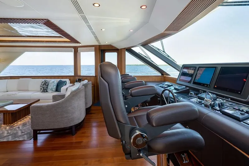 Slide: The Image of Luxurious interior of 2016 Ocean Alexander 100 Skylounge Megayacht with helm and seating area. - 23