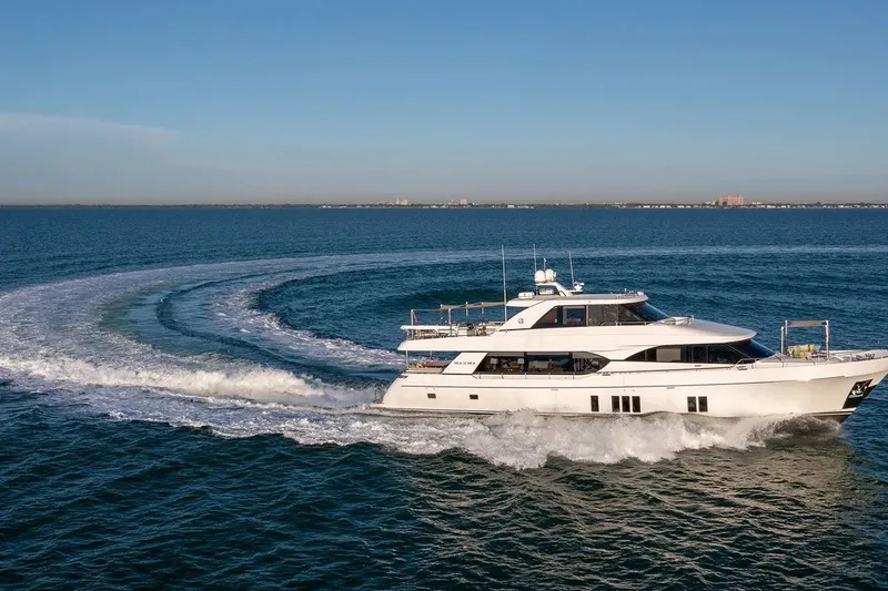 Slide: The Image of 2016 Ocean Alexander 100 Skylounge Megayacht cruising on open water. - 33
