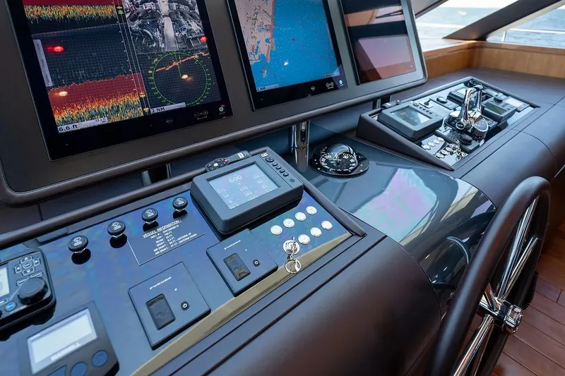Slide: The Image of Control panel of a 2016 Ocean Alexander 100 Skylounge Megayacht with advanced navigation displays. - 22