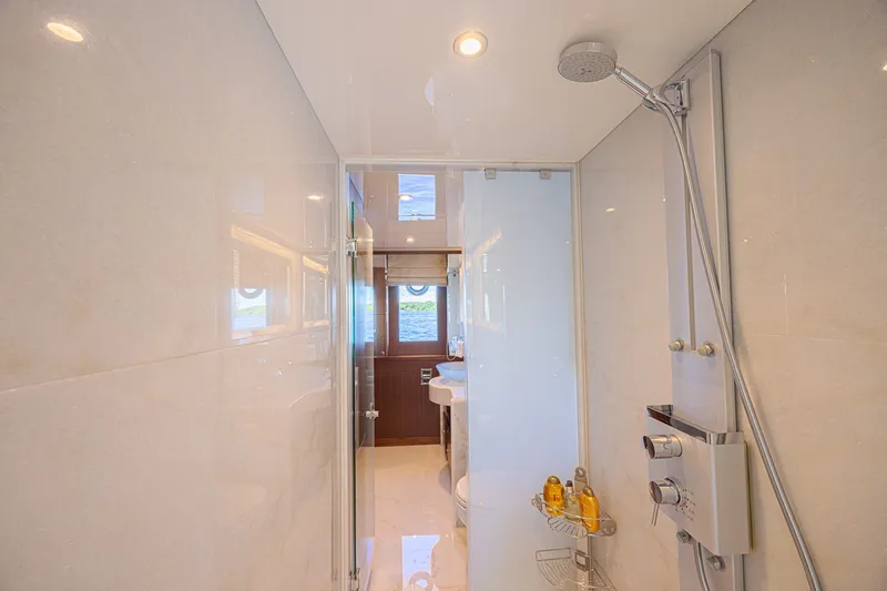 Slide: The Image of Luxurious bathroom in 2016 Ocean Alexander 100 Skylounge Megayacht with modern shower amenities. - 31