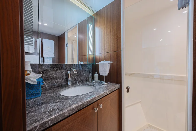 Slide: The Image of Luxurious bathroom in 2016 Ocean Alexander 100 Skylounge Megayacht with marble countertop. - 38