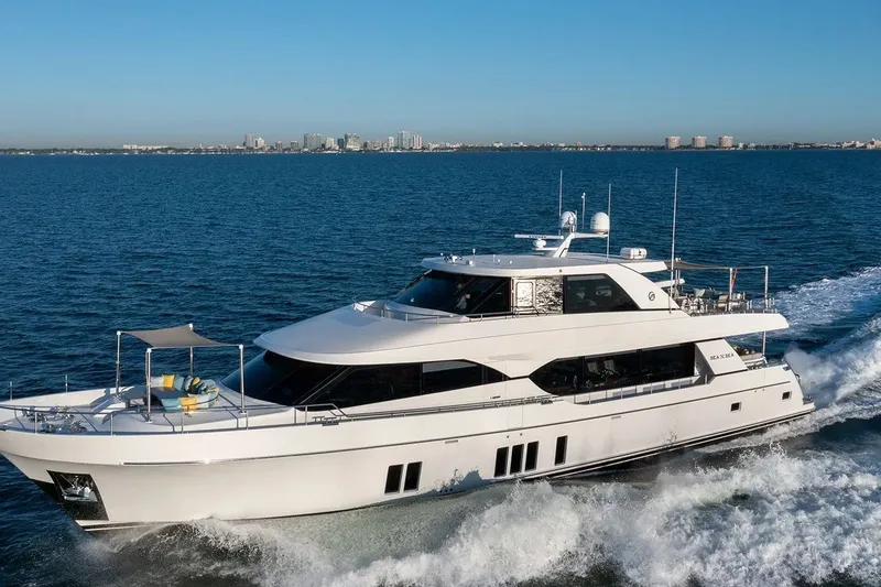 Slide: The Image of 2016 Ocean Alexander 100 Skylounge Megayacht cruising on open water. - 34