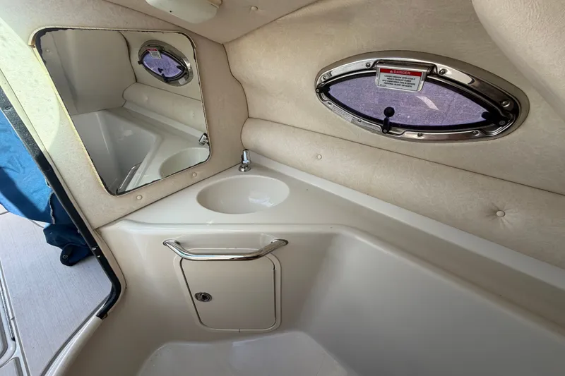 Slide: The Image of Interior of 2008 Sea Ray 240 Sundeck boat with sink and mirror. - 37