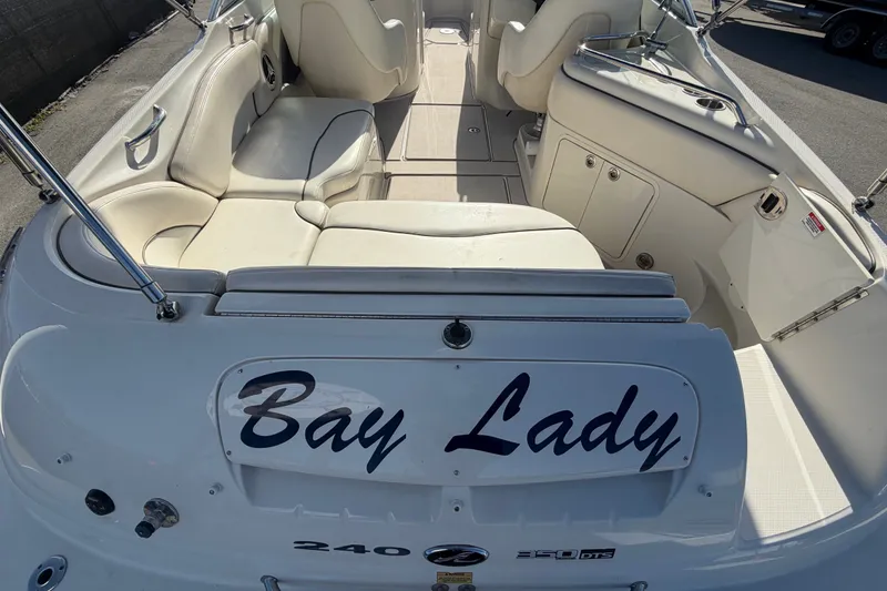Slide: The Image of 2008 Sea Ray 240 Sundeck boat interior with "Bay Lady" nameplate. - 17
