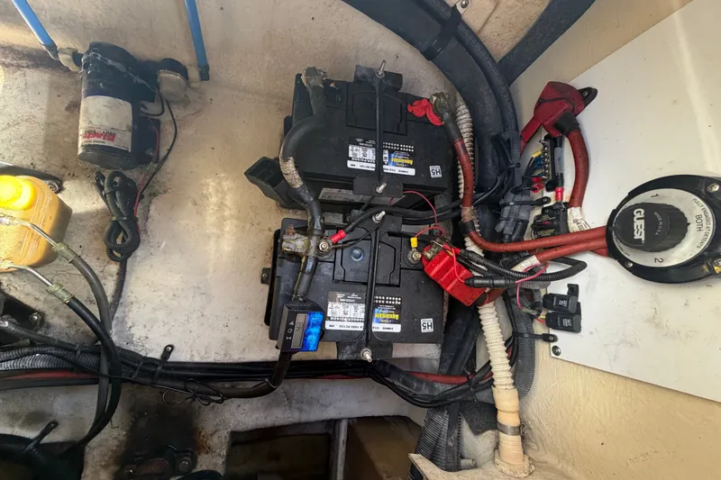 Slide: The Image of Electrical system of a 2008 Sea Ray 240 Sundeck boat, featuring batteries and wiring. - 80