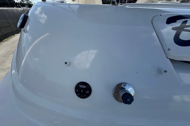 Slide: The Image of 2008 Sea Ray 240 Sundeck boat stern with control panel and fittings. - 18