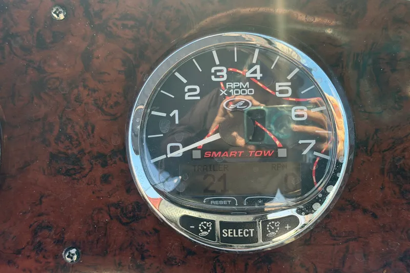 Slide: The Image of Tachometer of 2008 Sea Ray 240 Sundeck boat displaying RPM and Smart Tow feature. - 42