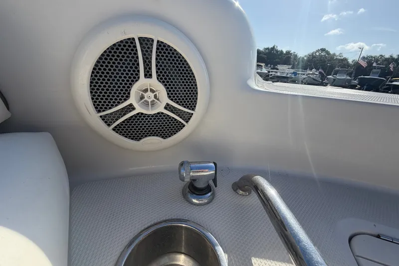 Slide: The Image of Interior of 2008 Sea Ray 240 Sundeck featuring speaker and faucet. - 59