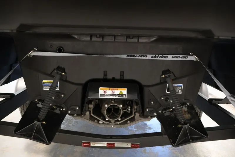 Slide: The Image of Rear view of 2027 Sea-Doo Switch Cruise 21, showcasing engine and safety features. - 25