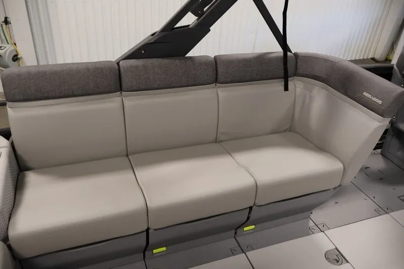 Slide: The Image of 2027 Sea-Doo Switch Cruise 21 interior seating, featuring modern gray upholstery. - 26
