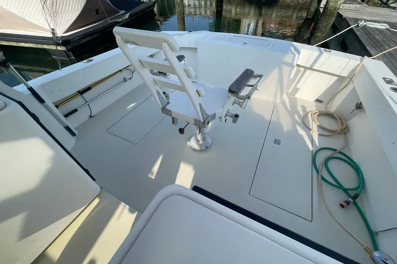 Slide: The Image of 2004 CAROLINA CLASSIC 28 COCKPIT OVERVIEW W/FIGHTING CHAIR, IN DECK FISH BOXES AND TRANSOM FISHBOX - 4
