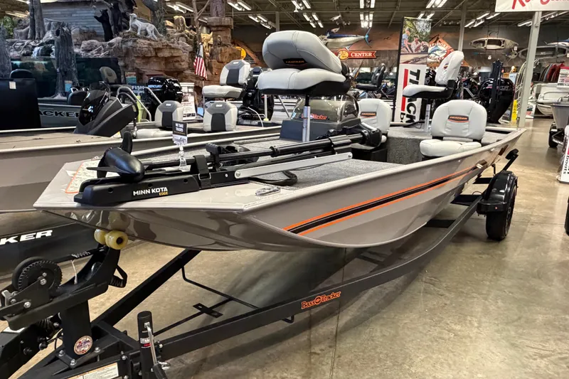 Slide: The Image of 2027 Tracker Bass Tracker Classic Limited boat displayed in showroom with Minn Kota trolling motor. - 33