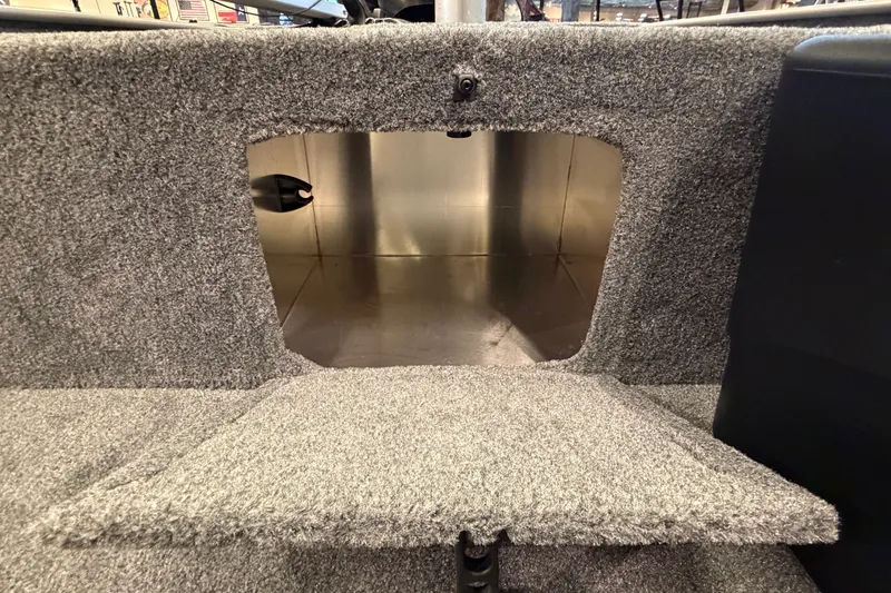 Slide: The Image of Interior storage compartment of 2027 Tracker Bass Tracker Classic Limited boat. - 46