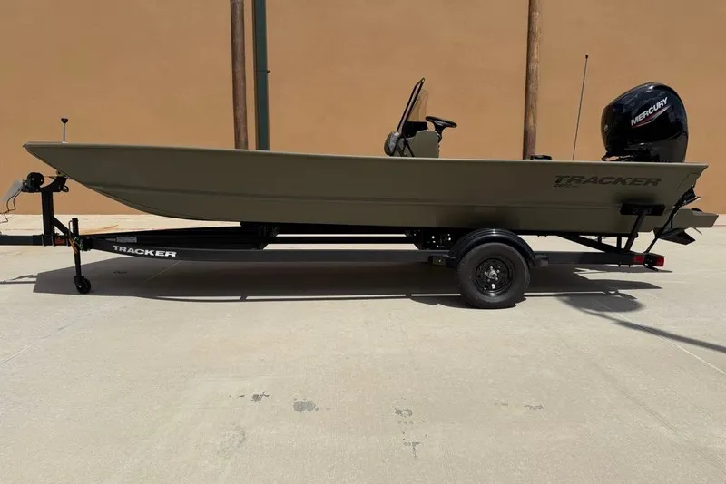 The Image of 2027 Tracker Grizzly 2072 CC boat on trailer, side view, outdoors. - 0