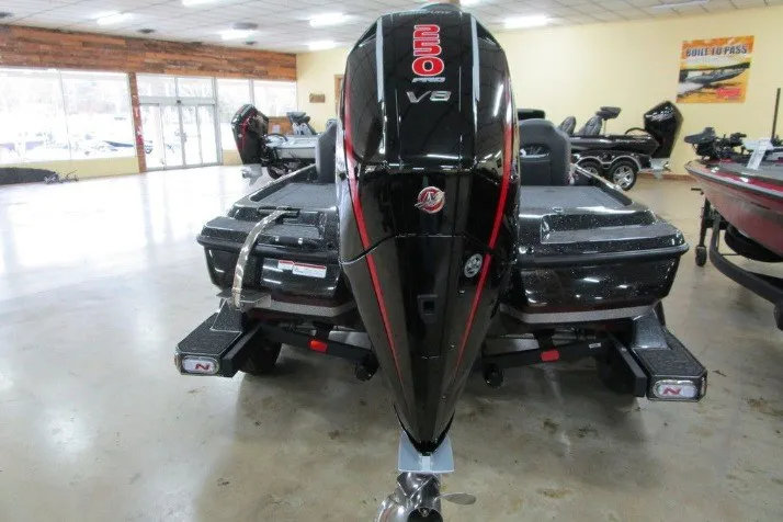 Slide: The Image of 2026 Nitro Z21 XL Pro boat with powerful 250 V8 engine in showroom. - 4