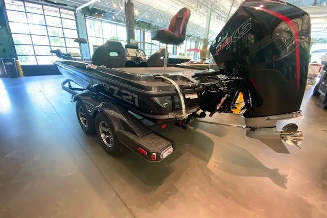 Slide: The Image of 2026 Nitro Z21 XL Pro boat in showroom, featuring sleek design and powerful engine. - 9