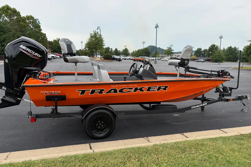 The Image of 2027 Tracker Pro Team 175 boat with Mercury engine, parked outdoors. - 0