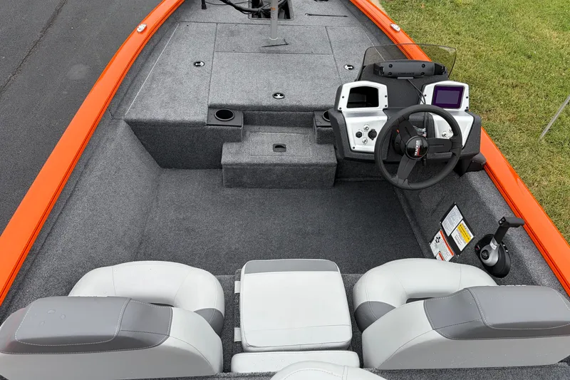 Slide: The Image of 2027 Tracker Pro Team 175 boat interior with steering console and seating. - 15