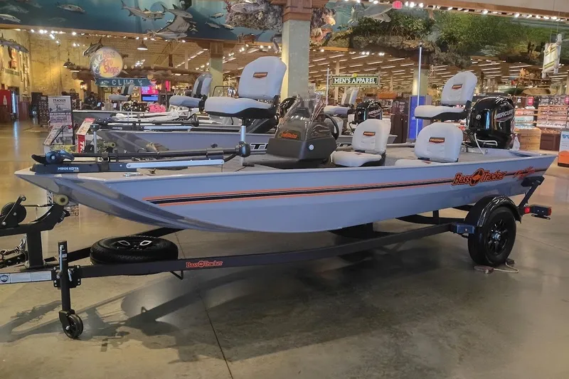 The Image of 2027 Tracker Bass Tracker Classic Limited boat displayed indoors on a trailer. - 0