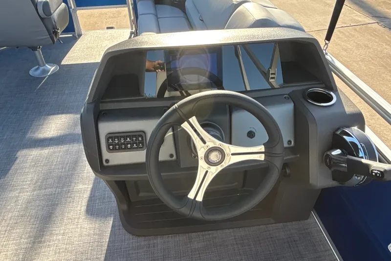 Slide: The Image of Steering console of 2027 Sun Tracker SportFish 20 DLX pontoon boat. - 23