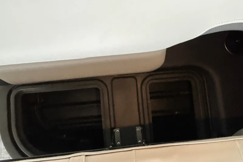 Slide: The Image of Storage compartment in 2027 Sun Tracker SportFish 20 DLX boat interior. - 30