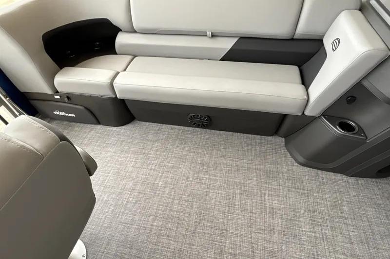 Slide: The Image of 2027 Sun Tracker SportFish 20 DLX interior with gray seating and flooring. - 14