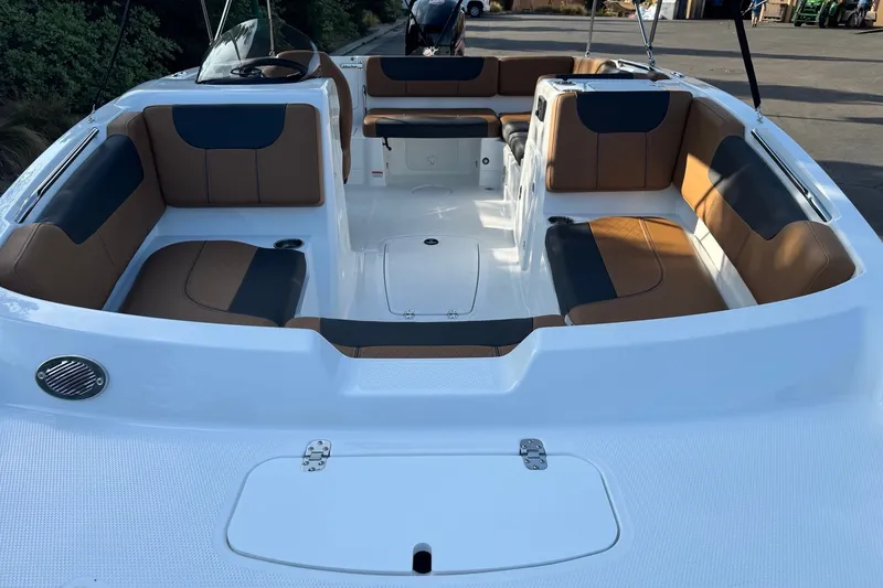 Slide: The Image of Modern Tahoe 1950 boat interior, 2027 model, featuring spacious seating and sleek design. - 10