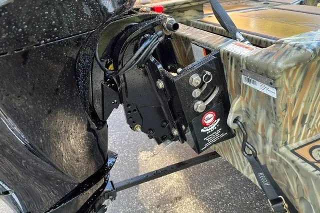 Slide: The Image of 2027 Tracker Grizzly 1756 T Marsh boat engine mount detail with camouflage design. - 72