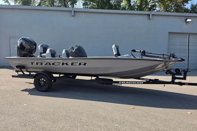 The Image of 2027 Tracker Pro Team 190 boat on trailer, parked outdoors. - 0