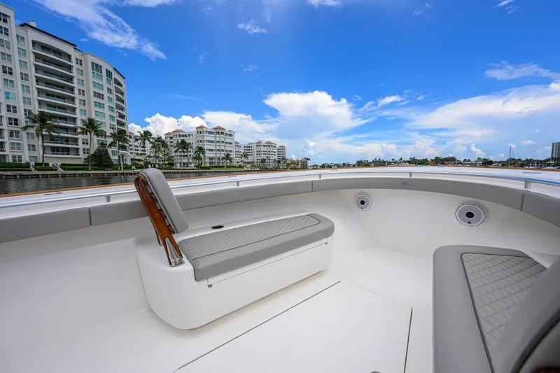 Slide: The Image of Valhalla V-41 boat interior with waterfront view, 2021 model, featuring luxurious seating. - 54