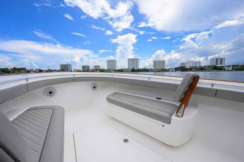 Slide: The Image of Luxurious 2021 Valhalla V-41 boat interior with city skyline and blue sky backdrop. - 53