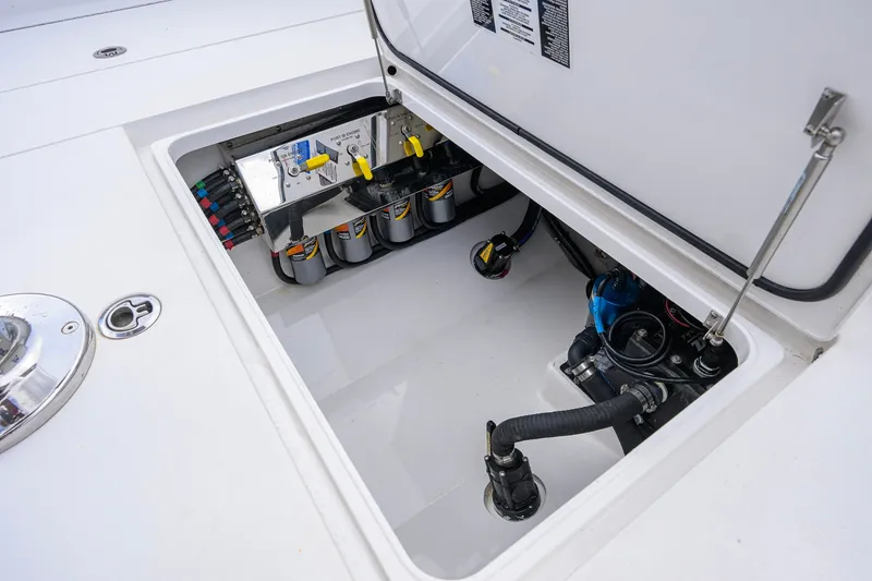 Slide: The Image of Open hatch of 2021 Valhalla V-41 boat showing internal components and wiring. - 67