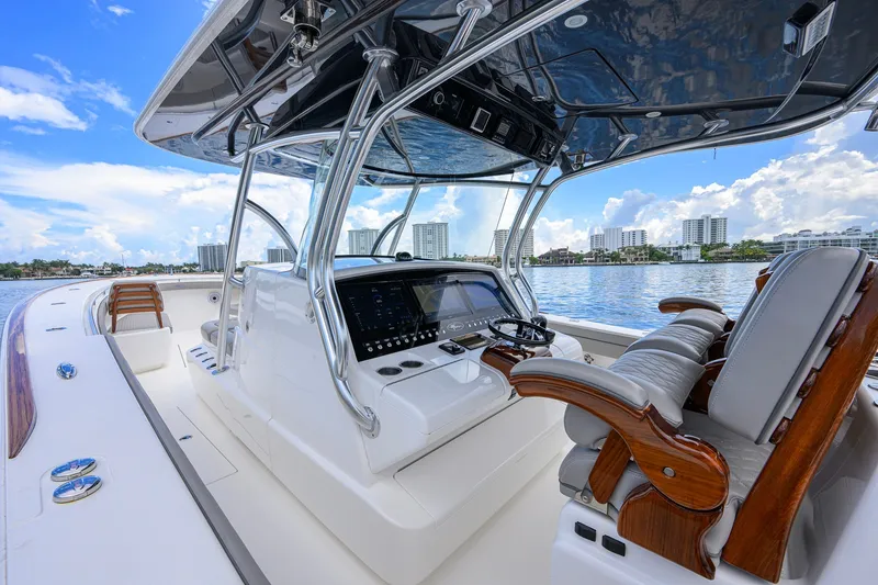 Slide: The Image of 2021 Valhalla V-41 boat interior with modern helm and luxurious seating. - 41