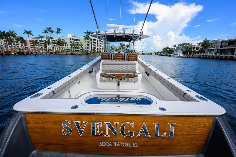 Slide: The Image of Valhalla V-41 boat named Svengali on a scenic waterway in Boca Raton, FL. - 16