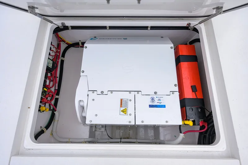 Slide: The Image of Engine compartment of 2021 Valhalla V-41 boat, featuring electrical components and wiring. - 68
