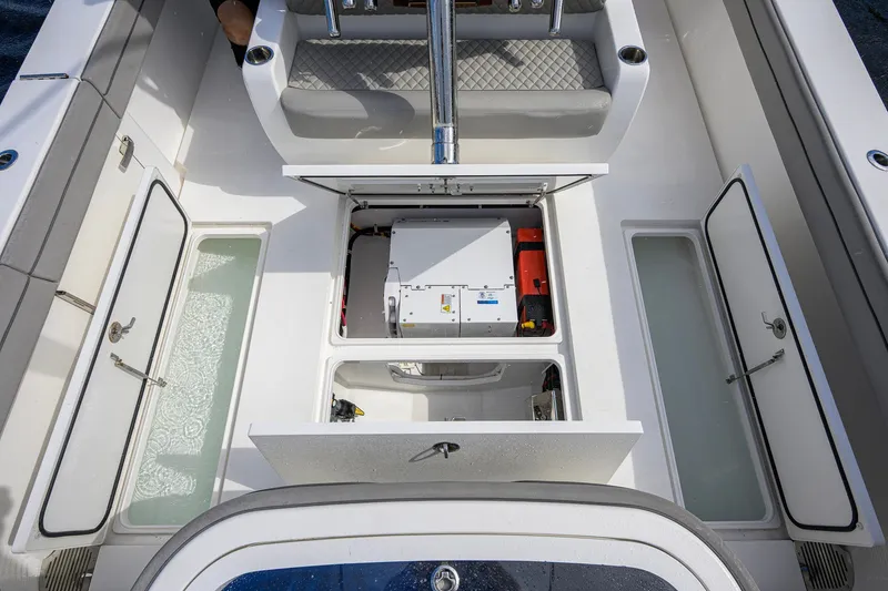 Slide: The Image of 2021 Valhalla V-41 boat interior with open storage compartments and seating. - 36
