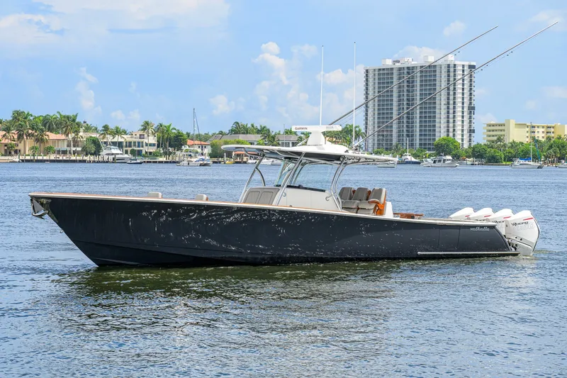 The Image of 2021 Valhalla V-41 boat on water, with cityscape and palm trees in background. - 0