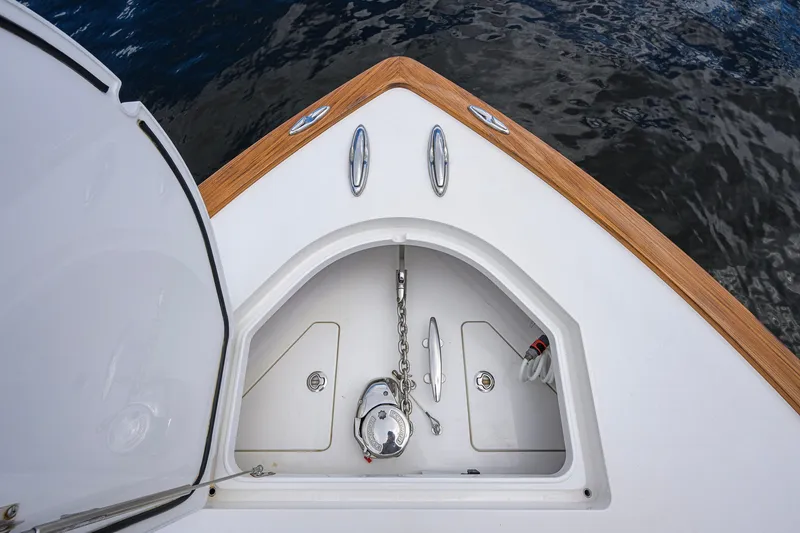 Slide: The Image of Bow view of 2021 Valhalla V-41 boat with anchor storage and teak accents. - 62